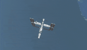 以地球为背景的空间站组合体全貌示意图 以地球为背景的空间站组合体全貌示意图